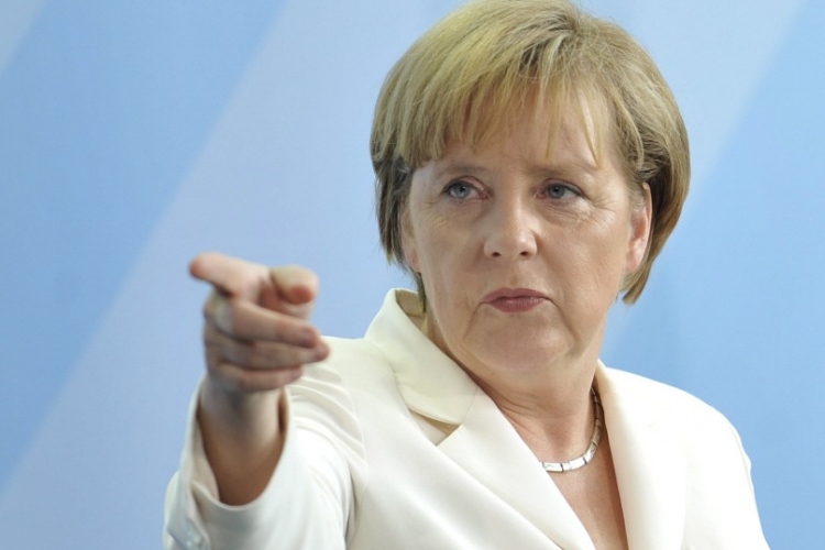 Merkel: csak önkéntes alapon történhet a menekültek átvétele